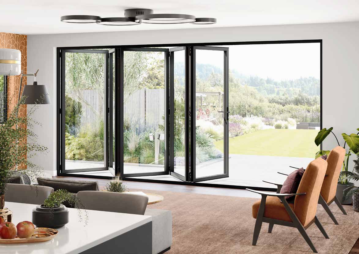 Aluminium slimline bifold doors folded open onto a garden